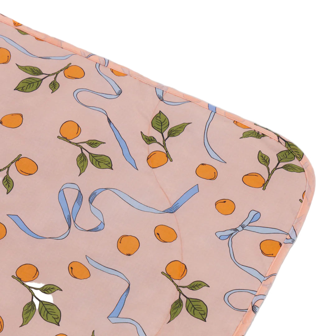 Puffy Picnic Blanket in Apricots and Ribbons, close up to show pattern
