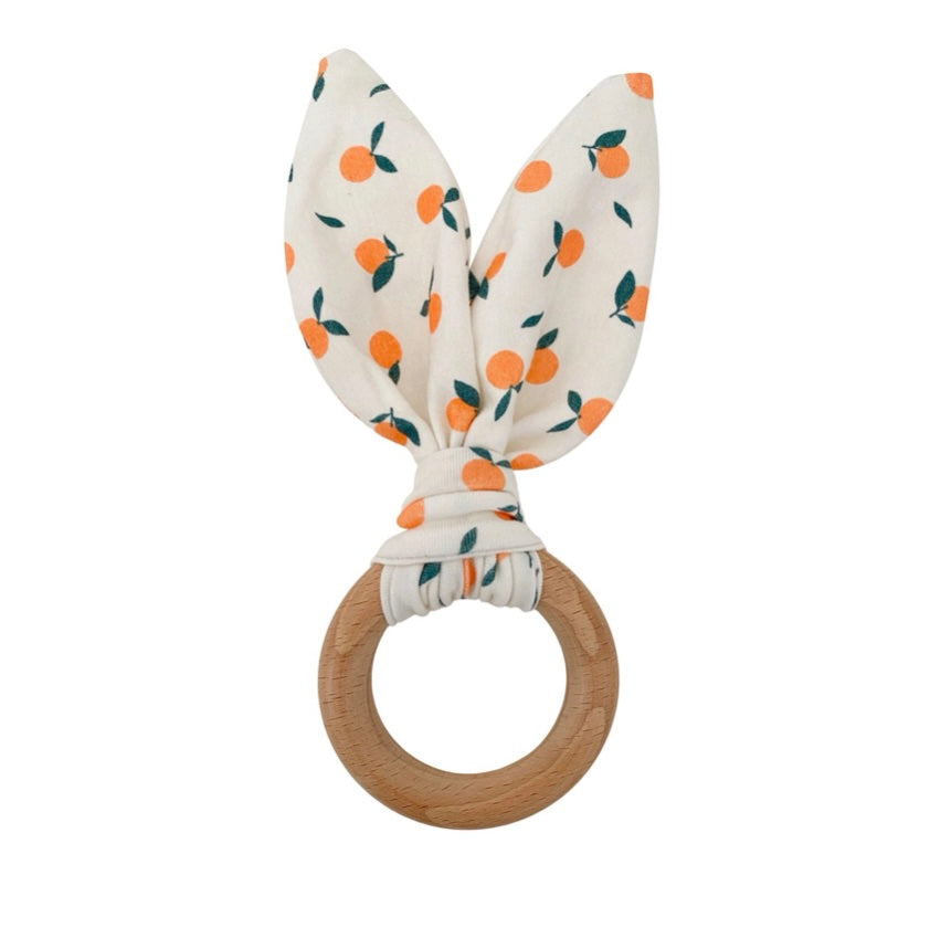 Chewable Charm Bunny Teether in Clementine
