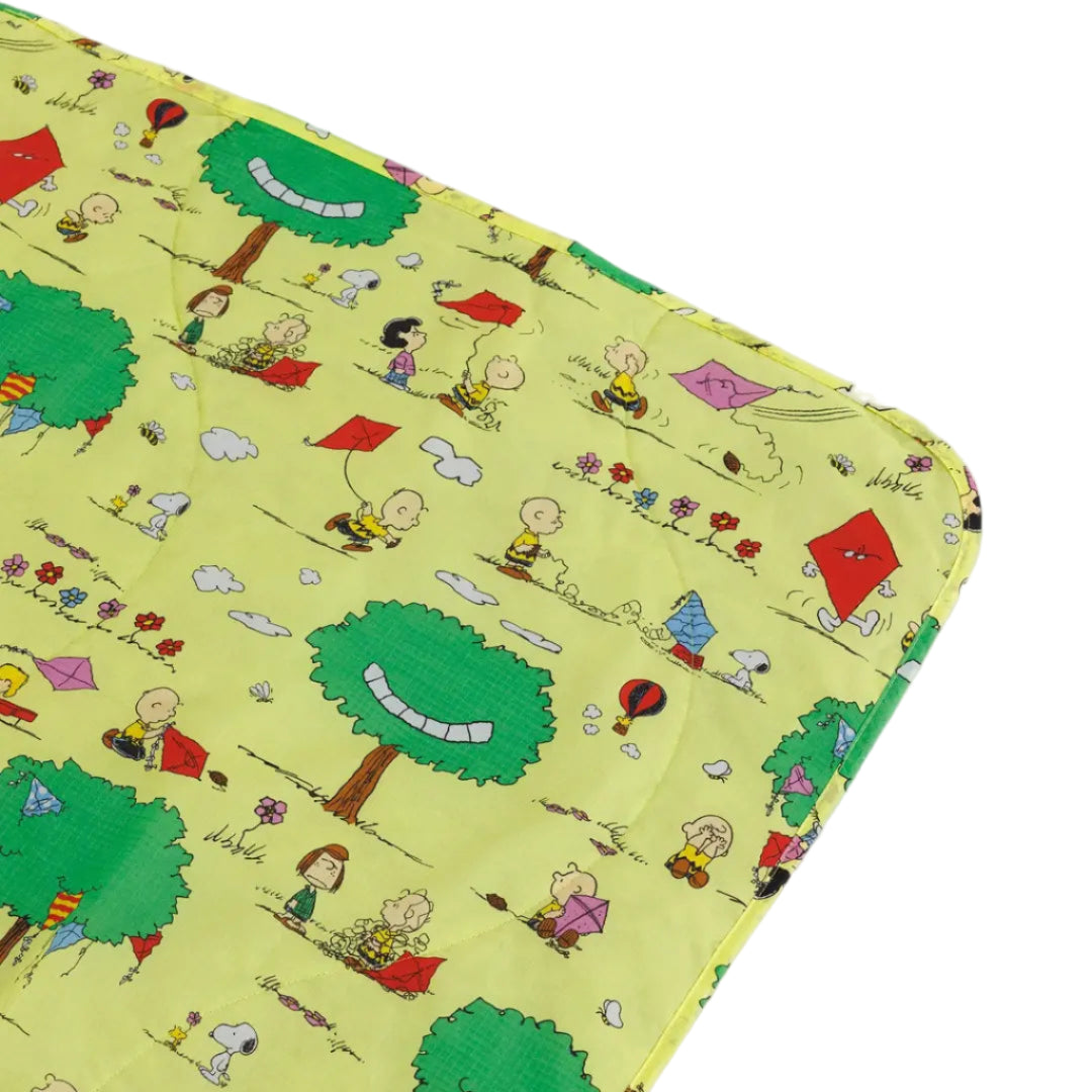Puffy Picnic Blanket in Kite Eating Tree pattern, close up to show icons